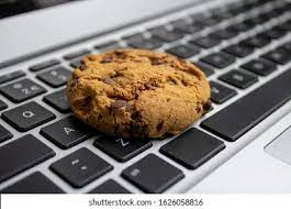 A cookie on a laptop keyboard